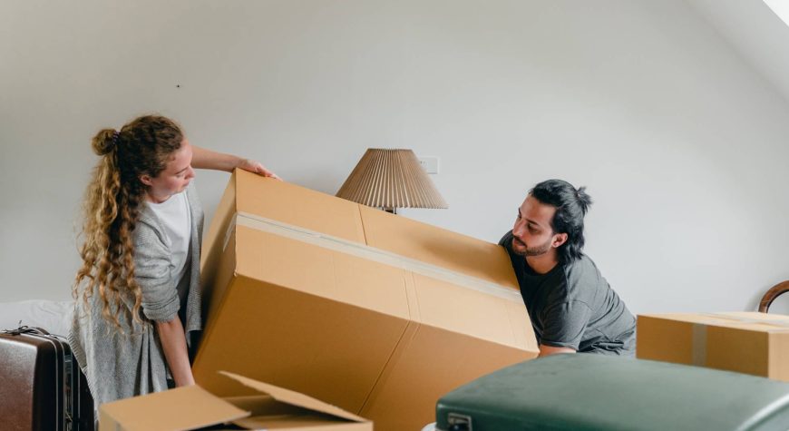 Couple moving boxes